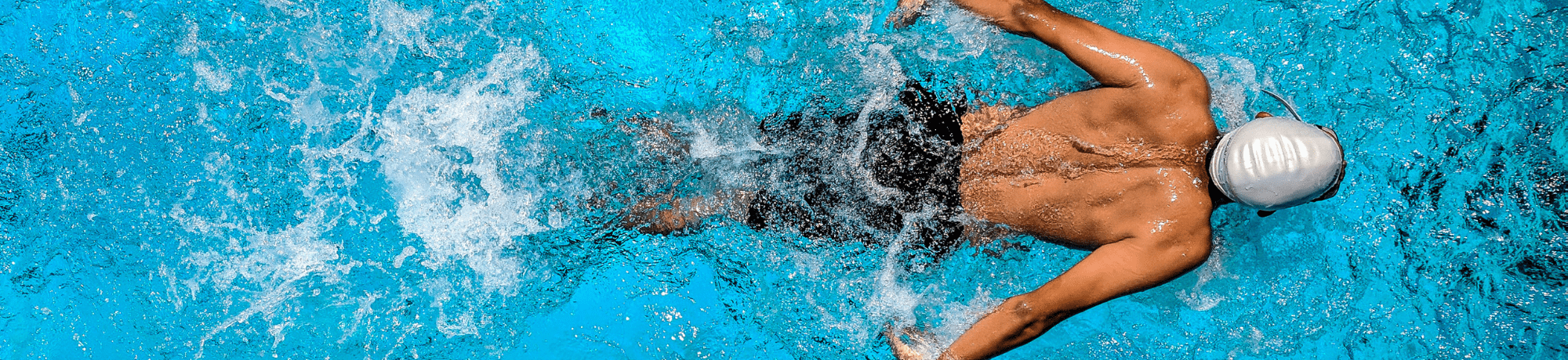 Man Swimming In Pool