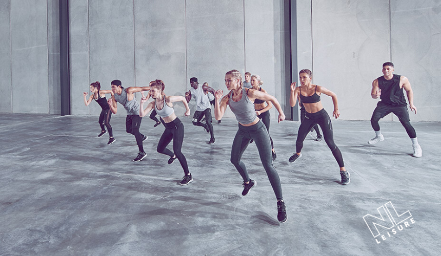 group of people taking part in a fitness class