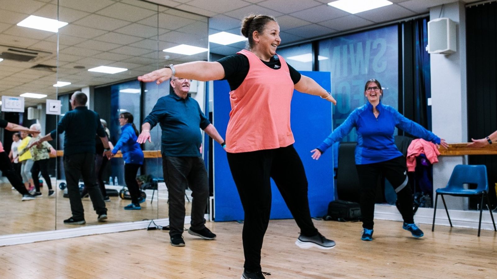 group taking part in a fitness class